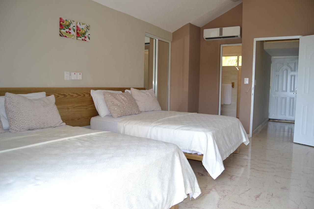 Paradise Island Beach Resort Punta Rucia Habitación foto